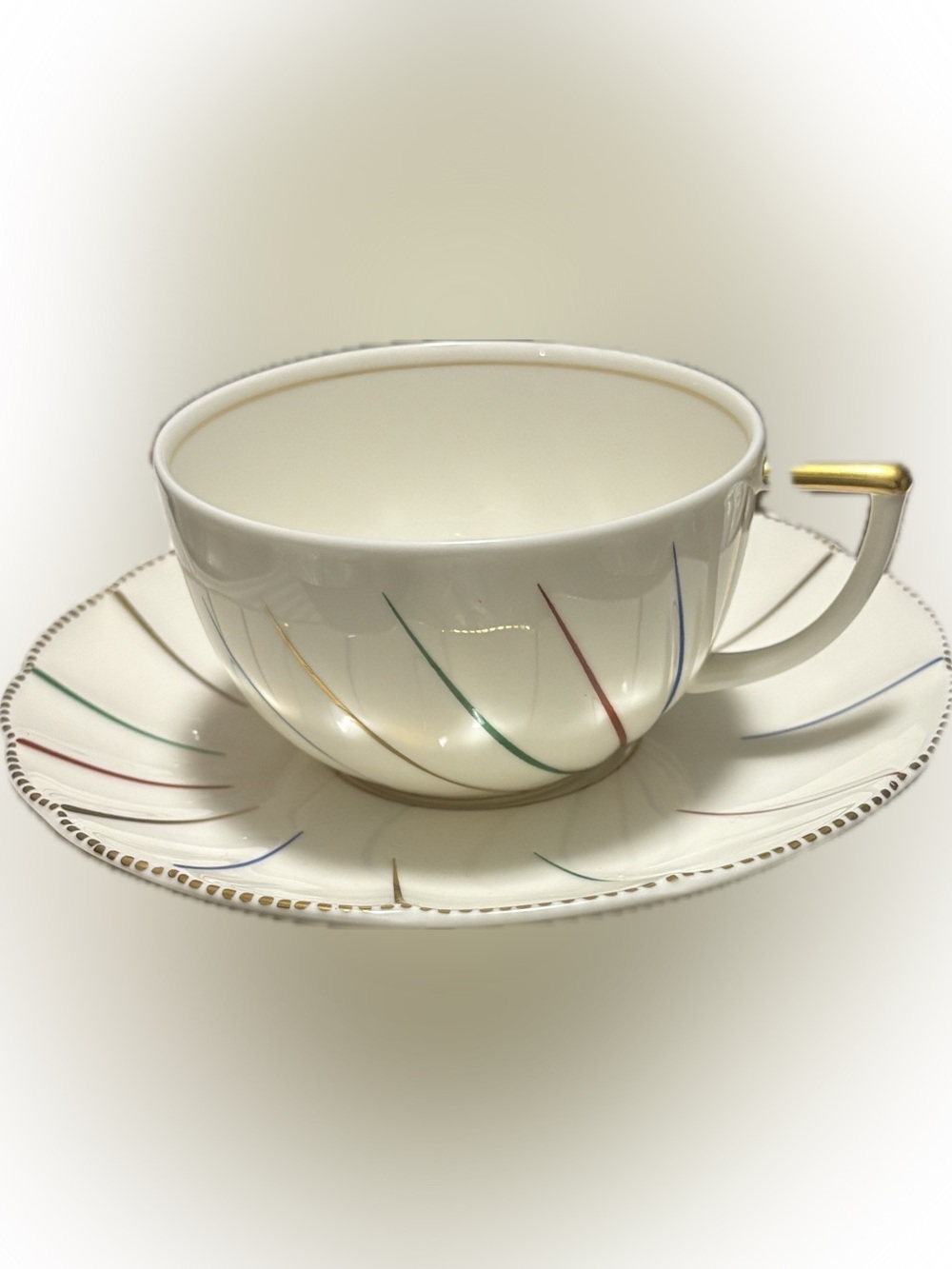 Set of five Lanvin White Porcelain Cup and Saucer with Multicolor Swirl Accent